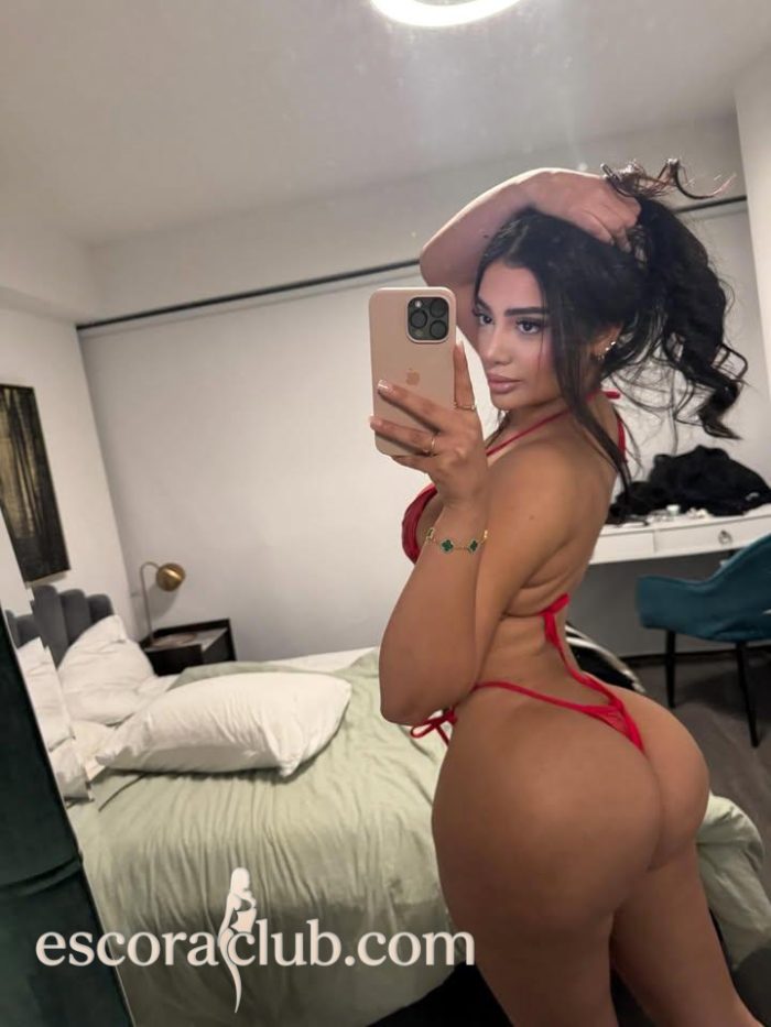 Elegant French escort Lona posing gracefully